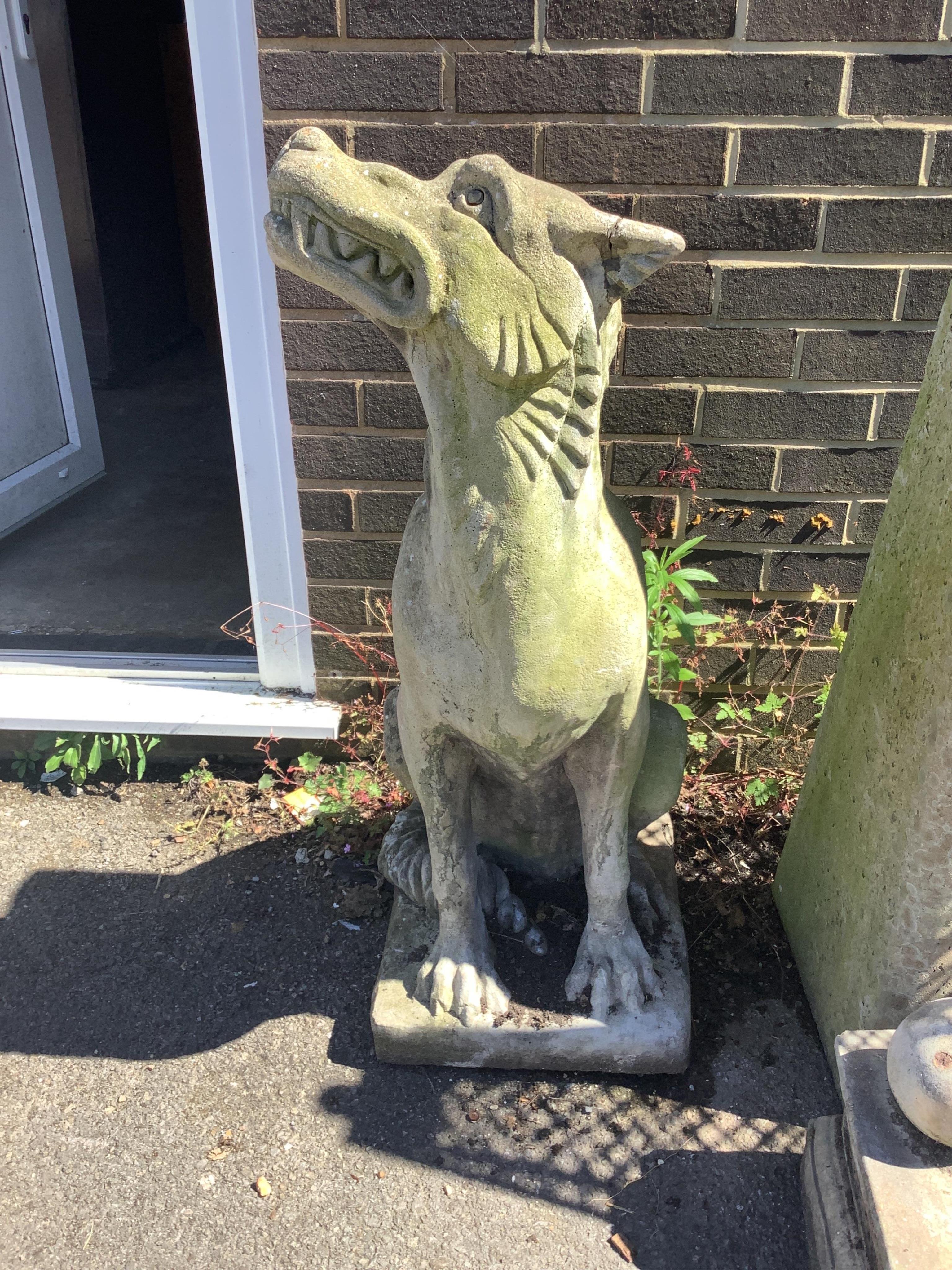 A reconstituted stone gargoyle garden ornament, height 100cm. Condition - fair